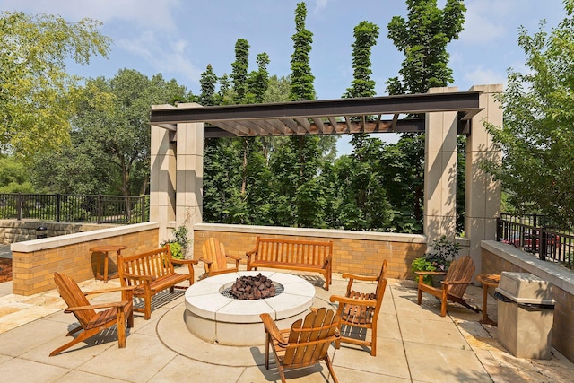 view of patio featuring a fire pit