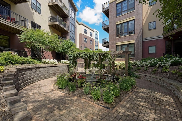 view of property's community featuring a pergola