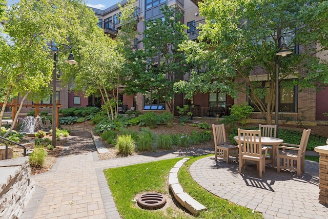 surrounding community with a patio