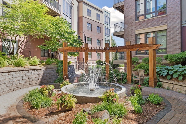 view of home's community featuring a pergola