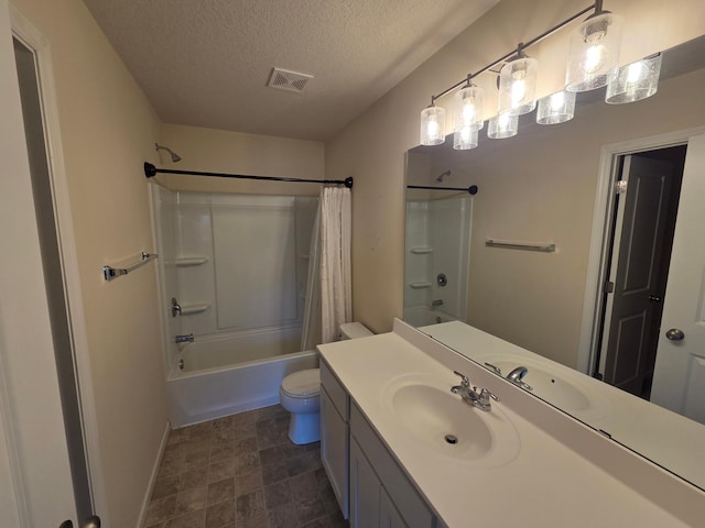 bathroom with visible vents, toilet, shower / bath combo with shower curtain, vanity, and a textured ceiling