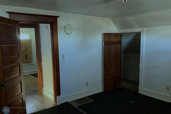 interior space featuring lofted ceiling