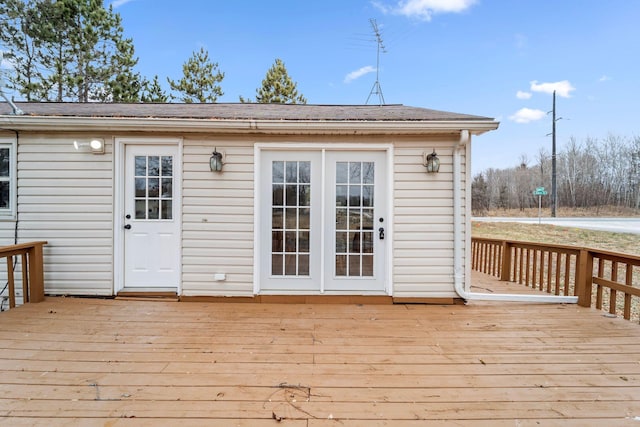 wooden deck featuring an outdoor structure