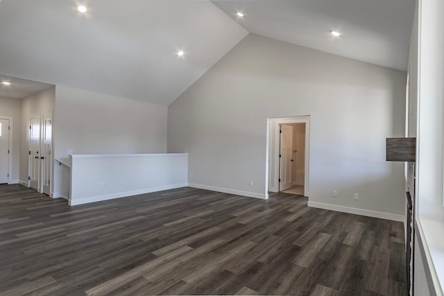 interior space with recessed lighting, baseboards, high vaulted ceiling, and dark wood-style flooring