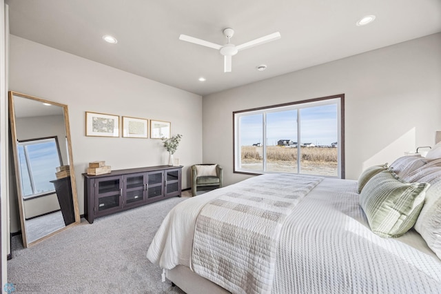 bedroom featuring baseboard heating, recessed lighting, carpet floors, and ceiling fan