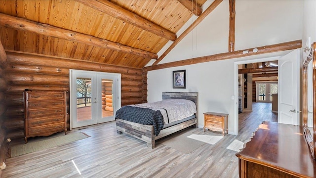 bedroom with beam ceiling, high vaulted ceiling, light wood-style flooring, french doors, and access to exterior