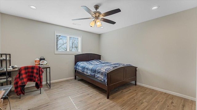 bedroom featuring visible vents, recessed lighting, baseboards, and light wood-style floors