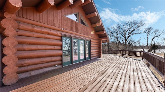 wooden deck featuring french doors