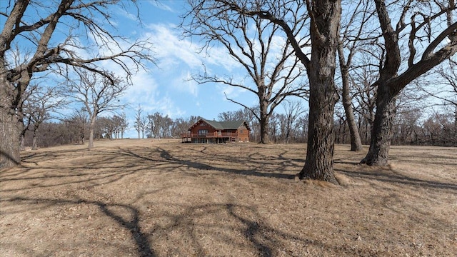 view of yard featuring a wooden deck