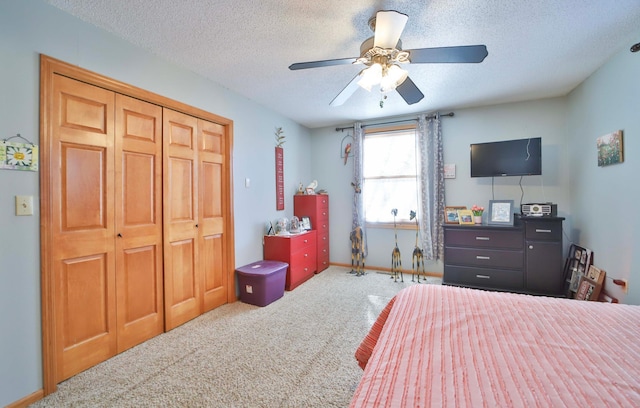 8403 Red Pine Cir, Baxter, MN 56425 - carpeted bedroom featuring a textured ceiling, a ceiling fan, a closet, and baseboards