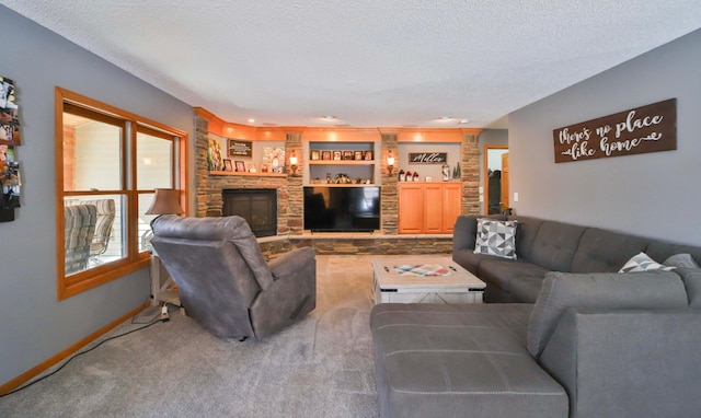 8403 Red Pine Cir, Baxter, MN 56425 - carpeted living area featuring a textured ceiling, baseboards, and a stone fireplace