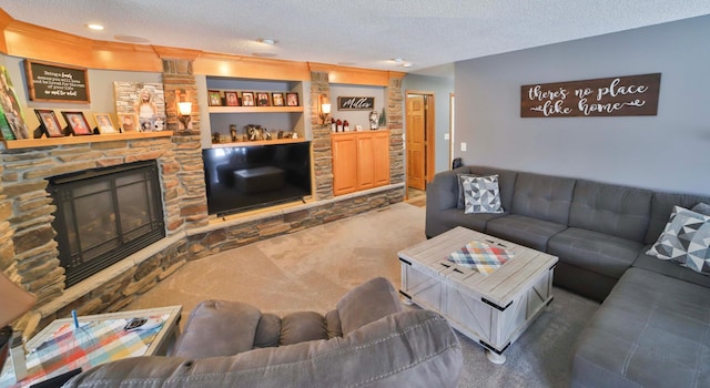 8403 Red Pine Cir, Baxter, MN 56425 - living area featuring carpet flooring, a textured ceiling, a stone fireplace, and recessed lighting
