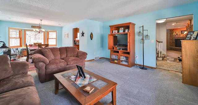 8403 Red Pine Cir, Baxter, MN 56425 - living room with a chandelier, carpet, a textured ceiling, and baseboards