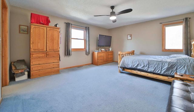 8403 Red Pine Cir, Baxter, MN 56425 - bedroom with light colored carpet, baseboards, and ceiling fan