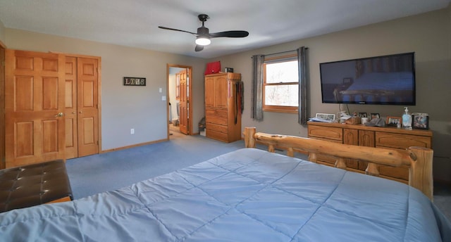 8403 Red Pine Cir, Baxter, MN 56425 - carpeted bedroom with baseboards and ceiling fan