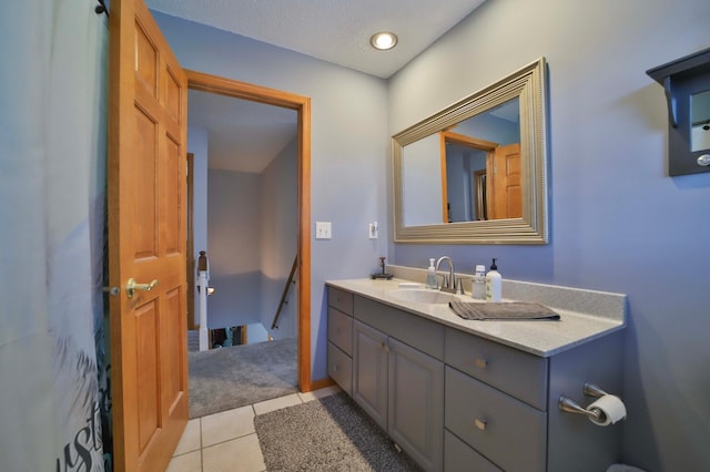 8403 Red Pine Cir, Baxter, MN 56425 - bathroom featuring vanity and tile patterned flooring