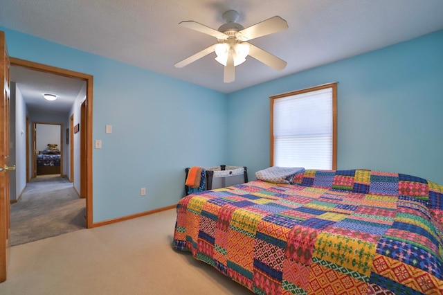 8403 Red Pine Cir, Baxter, MN 56425 - bedroom featuring carpet flooring, ceiling fan, and baseboards