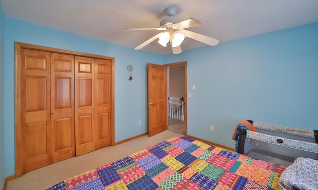 8403 Red Pine Cir, Baxter, MN 56425 - carpeted bedroom with baseboards, a ceiling fan, and a closet