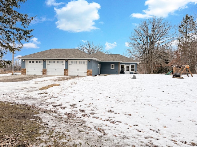 ranch-style home with a garage