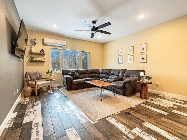 living room featuring an AC wall unit, dark wood-style floors, and baseboards