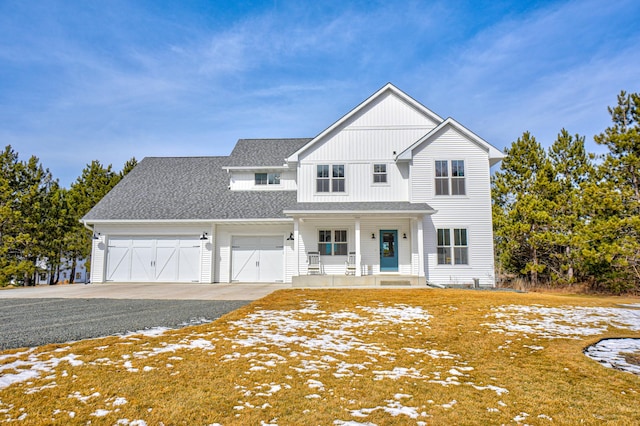 modern farmhouse style home with driveway, roof with shingles, covered porch, and an attached garage