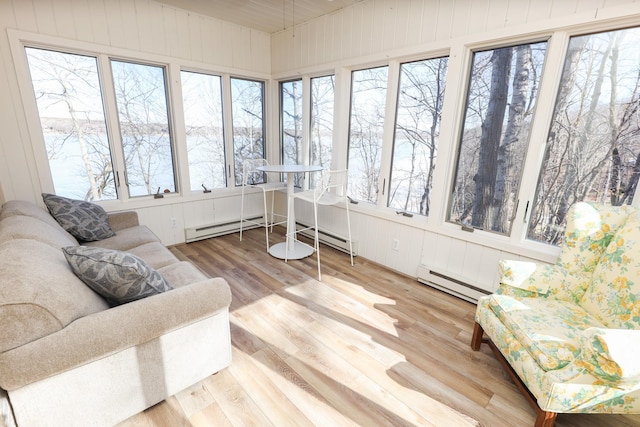 sunroom / solarium with a baseboard radiator