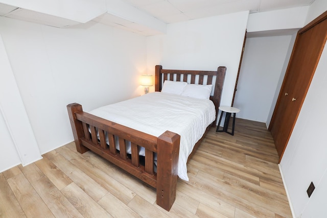 bedroom with light wood-type flooring