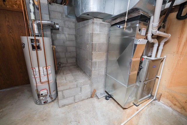 utility room with heating unit and gas water heater