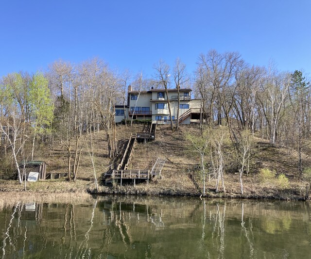 3694 Iona Way SW, Alexandria, MN 56308 - rear view of house featuring a deck with water view