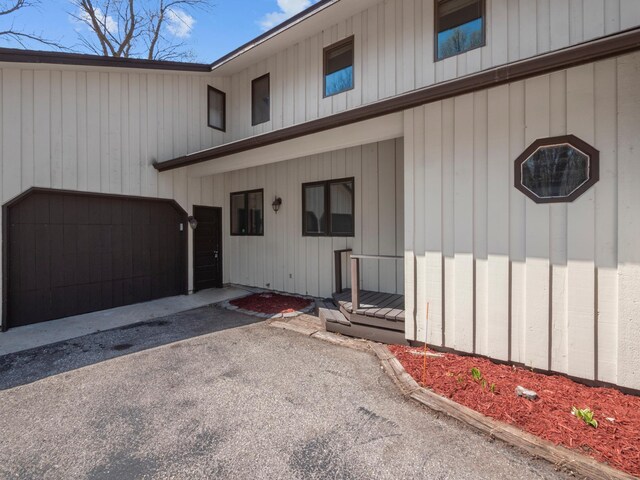 3694 Iona Way SW, Alexandria, MN 56308 - exterior space featuring aphalt driveway and an attached garage