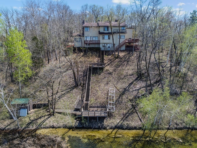 3694 Iona Way SW, Alexandria, MN 56308 - back of property featuring a deck and stairs
