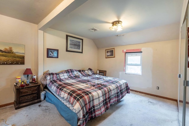 carpeted bedroom featuring visible vents, baseboards, and vaulted ceiling