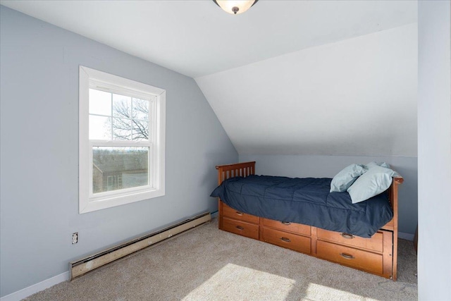 bedroom featuring carpet floors, a baseboard heating unit, and vaulted ceiling