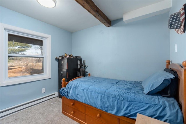 carpeted bedroom featuring a baseboard heating unit and beam ceiling