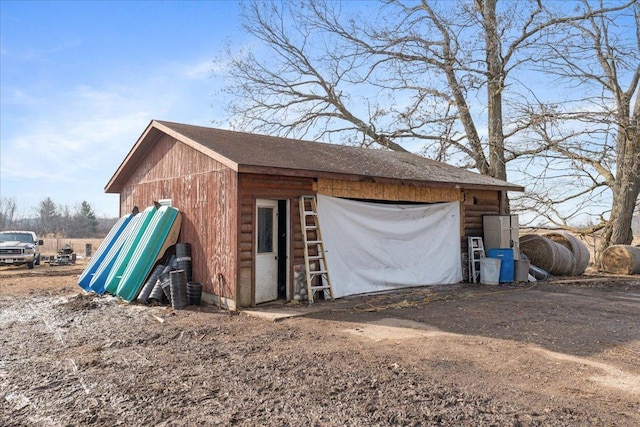 exterior space with an outbuilding