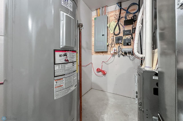 utility room featuring heating unit, electric panel, and electric water heater