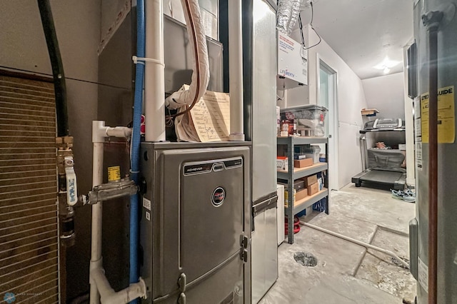 utility room with water heater