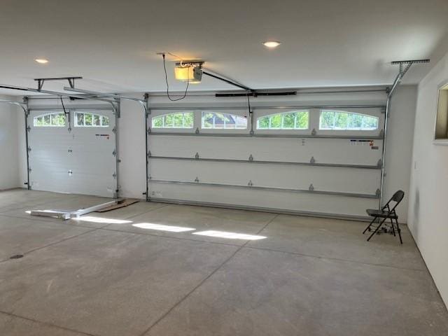 garage featuring a garage door opener