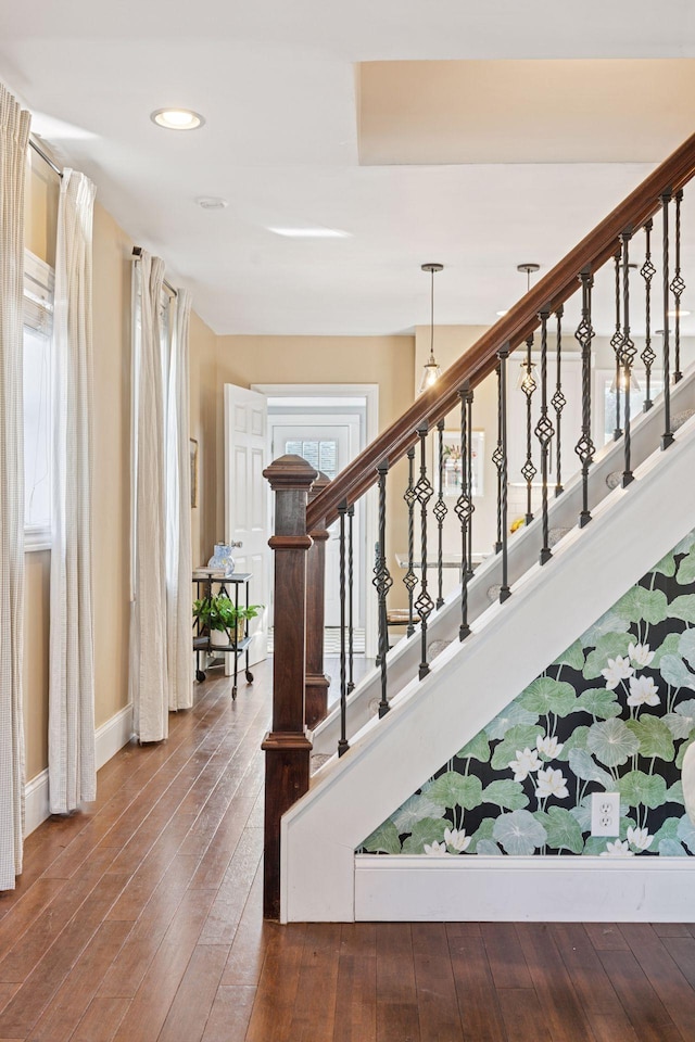 stairs with hardwood / wood-style floors, recessed lighting, and baseboards