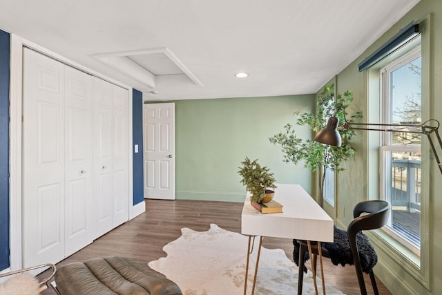 office space featuring recessed lighting, baseboards, and wood finished floors