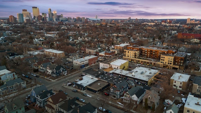 birds eye view of property featuring a city view