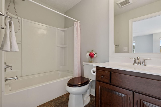 bathroom featuring visible vents, vanity, toilet, and shower / tub combo with curtain