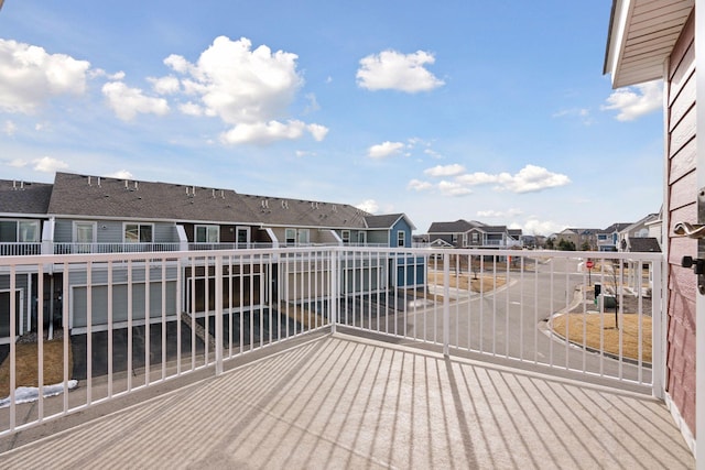 wooden deck with a residential view