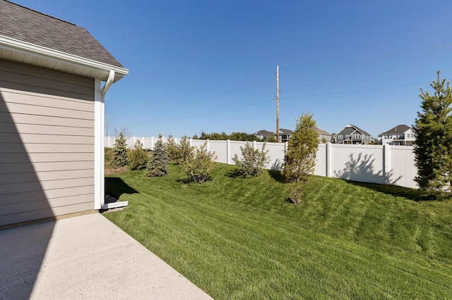 view of yard with a patio area and fence