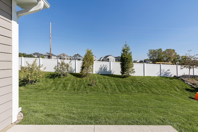 view of yard featuring a fenced backyard