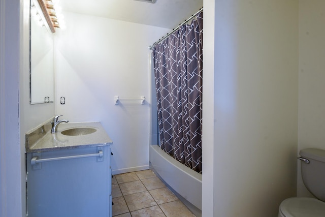 bathroom with tile patterned floors, shower / tub combo with curtain, toilet, and vanity