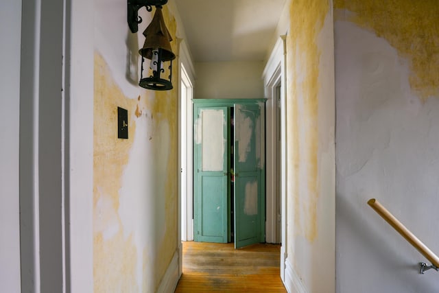 hallway with wood finished floors