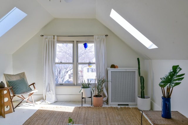 bonus room with lofted ceiling with skylight