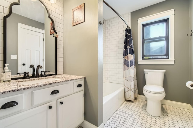 full bathroom featuring vanity, toilet, shower / tub combo, and baseboards