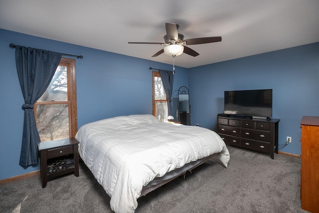 carpeted bedroom featuring a ceiling fan and baseboards